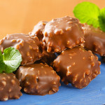 Chocolate pralines with chopped nuts